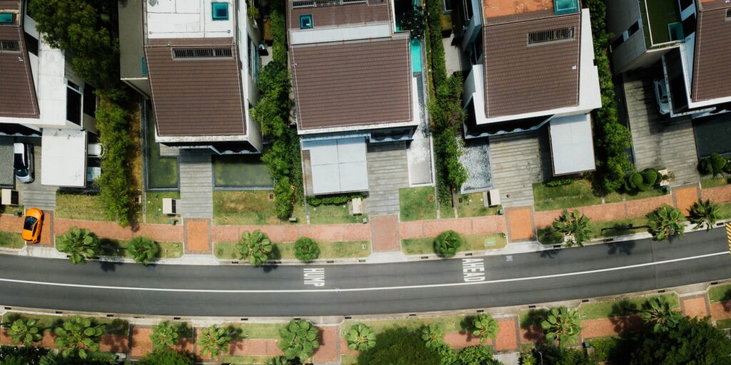 aerial photo of brown roof houses. emerging markets
