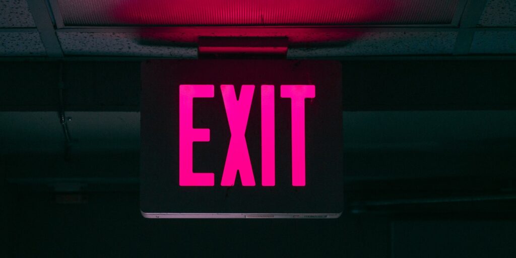 exit, black and pink Exit signage