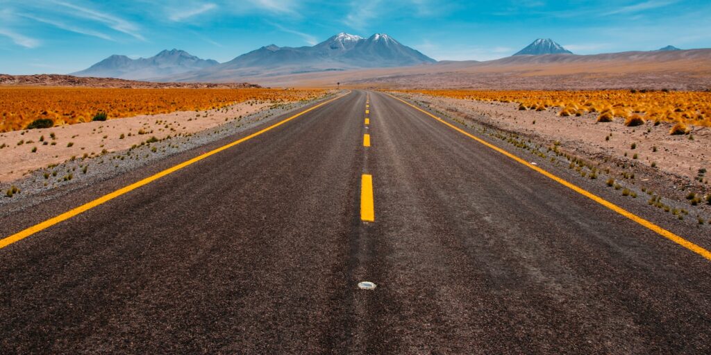 infrastructure, lone road going to mountains