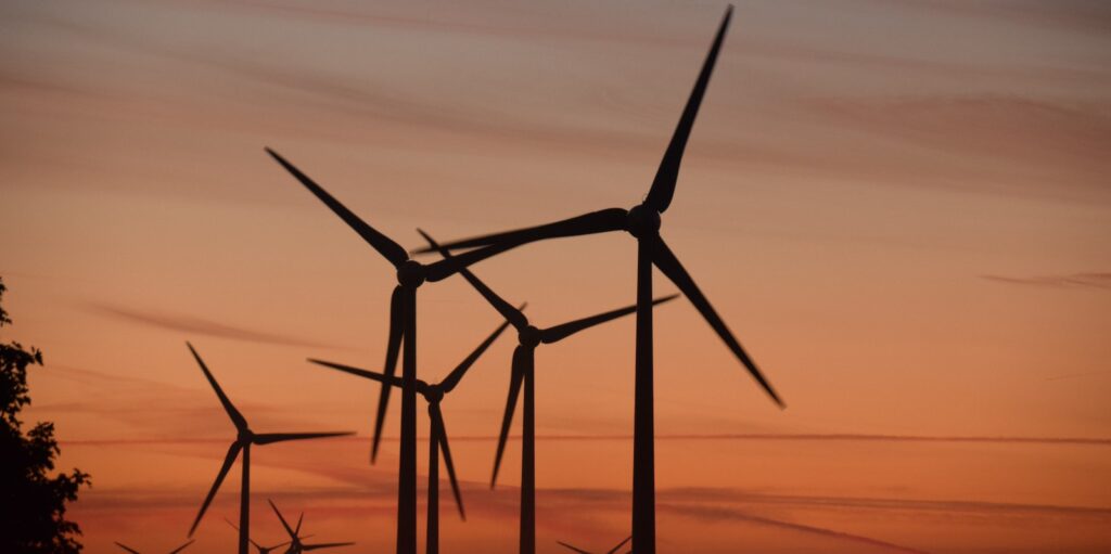 windmills during golden hour